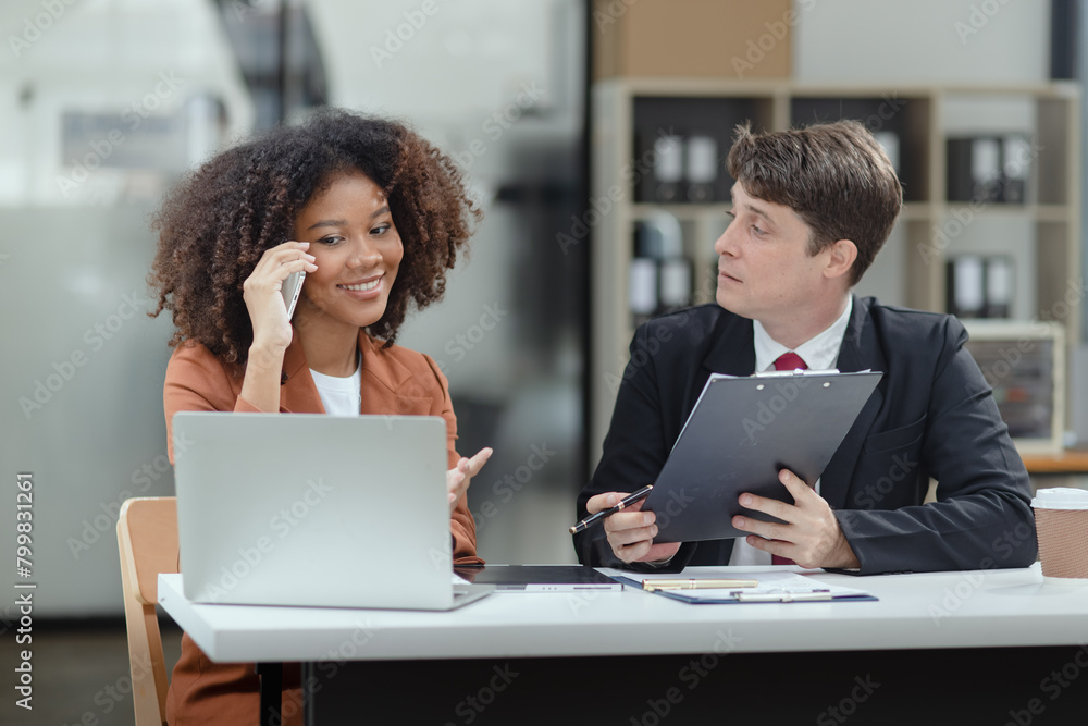 Obraz premium Lawyer or judge consult, Two female lawyers discussing about contract and agreement concept.