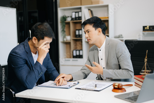 Wallpaper Mural Judge gavel with scales of justice, Business and lawyer or counselor consulting and discussing contract papers with laptop and tablet at law firm . Torontodigital.ca