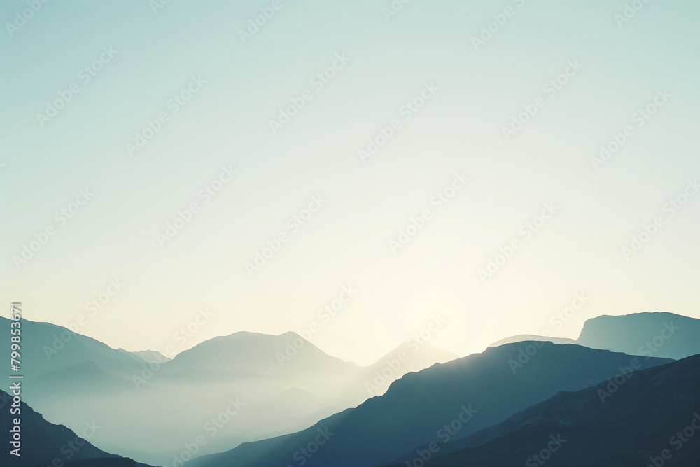 enchanting shot showcasing the beauty of distant mountain silhouettes set against a clear white sky, with delicate light illuminating the spaces between them, creating a scene of t