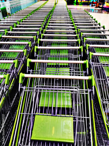 close up group of trolley waiting for service customer in supermaket