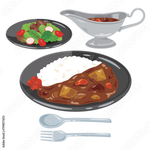 皿に盛られたカレーライスとサラダのセット