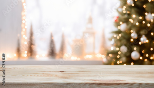 Empty wooden table over defocused christmas background with copy space