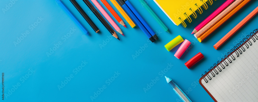 Fototapeta premium Academic Tools Display in Blue for Happy Teachers' Day Appreciation