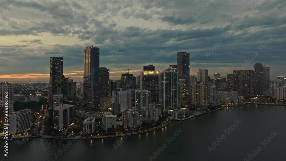 Aerial cinematic view of Miami Brickell downtown skyline at sunset. Aerial panoramic view of Miami modern skyscraper, hotels and residential buildings on a beautiful sunset. Miami Florida in 4K Aerial cinematic view of Miami Brickell downtown skyline at sunset. Aerial panoramic view of Miami modern skyscraper, hotels and residential buildings on a beautiful sunset. Miami Florida in 4K