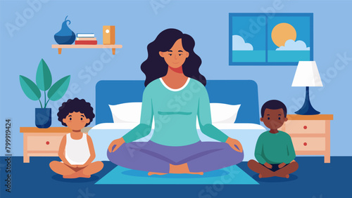 A mother sits on the edge of her bed taking a few minutes to meditate and recharge before starting her busy day with her family..