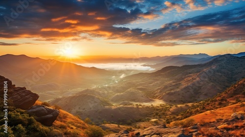 Breathtaking Sunset Over Rugged Mountain Landscape