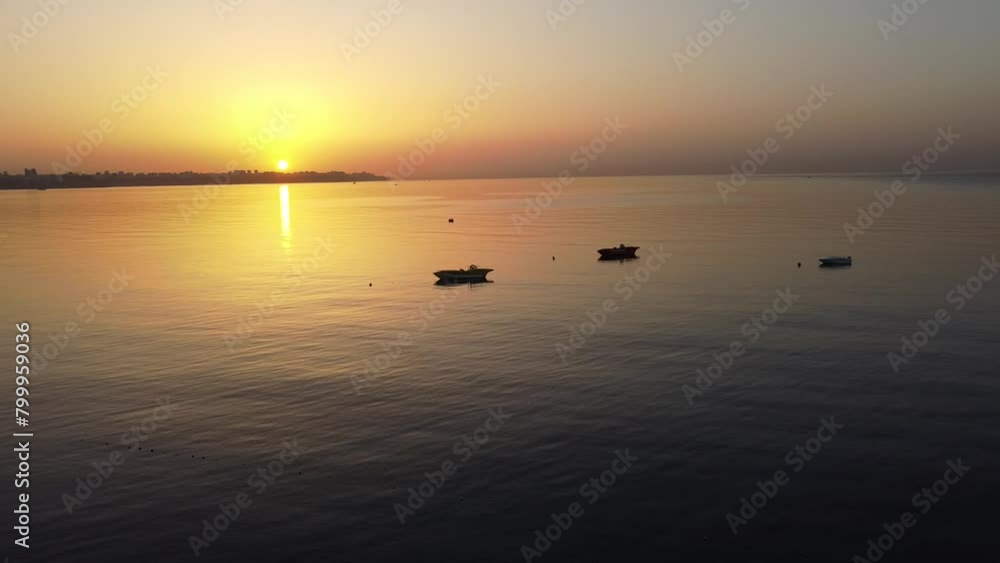 Konyaalti Beach park Antalya morning sunrise drone with a great aerial view of the sunrise. Drone flying over the beach. Konyaalti Beach is a popular tourist attraction in world famous Turkey. Konyaalti Beach park Antalya morning sunrise drone with a great aerial view of the sunrise. Drone flying over the beach. Konyaalti Beach is a popular tourist attraction in world famous Turkey.
