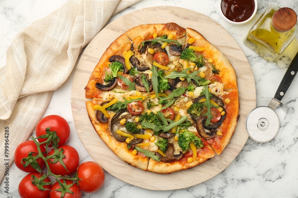 Delicious vegetarian pizza served on white marble table, flat lay Delicious vegetarian pizza served on white marble table, flat lay