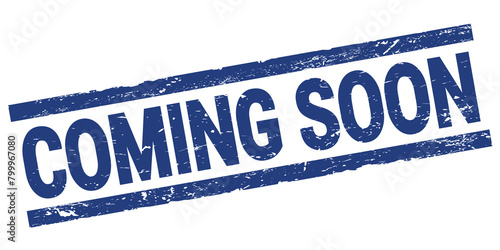 COMING SOON text on blue rectangle stamp sign.