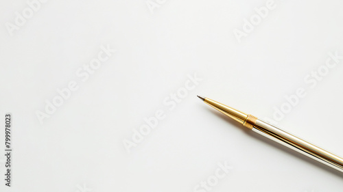 golden pen on white background