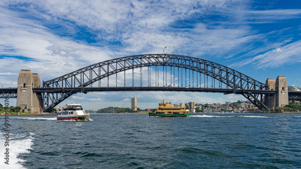 Naklejka premium Sydney, New South Wales, Australia: View of Sydney Harbour Bridge and ferry boats
