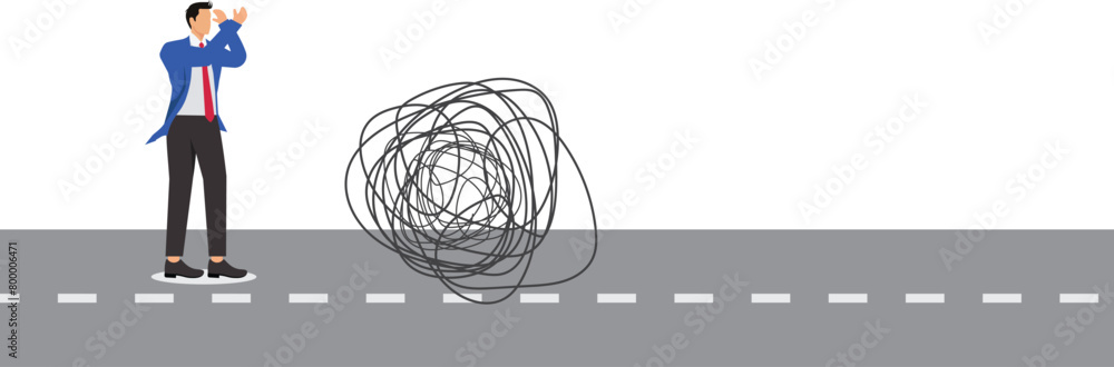 Businessman tries to find exit from complicated path Businessman tries to find exit from complicated path