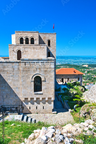 Kruje, Albania - 28 April, 2024: The Skanderbeg Museum in Kruja, Albania. The building of George Castriot ( Skanderbeg ) - national albanian hero. Kruje Castle and fortress. This was on a hot, sunny,  photo