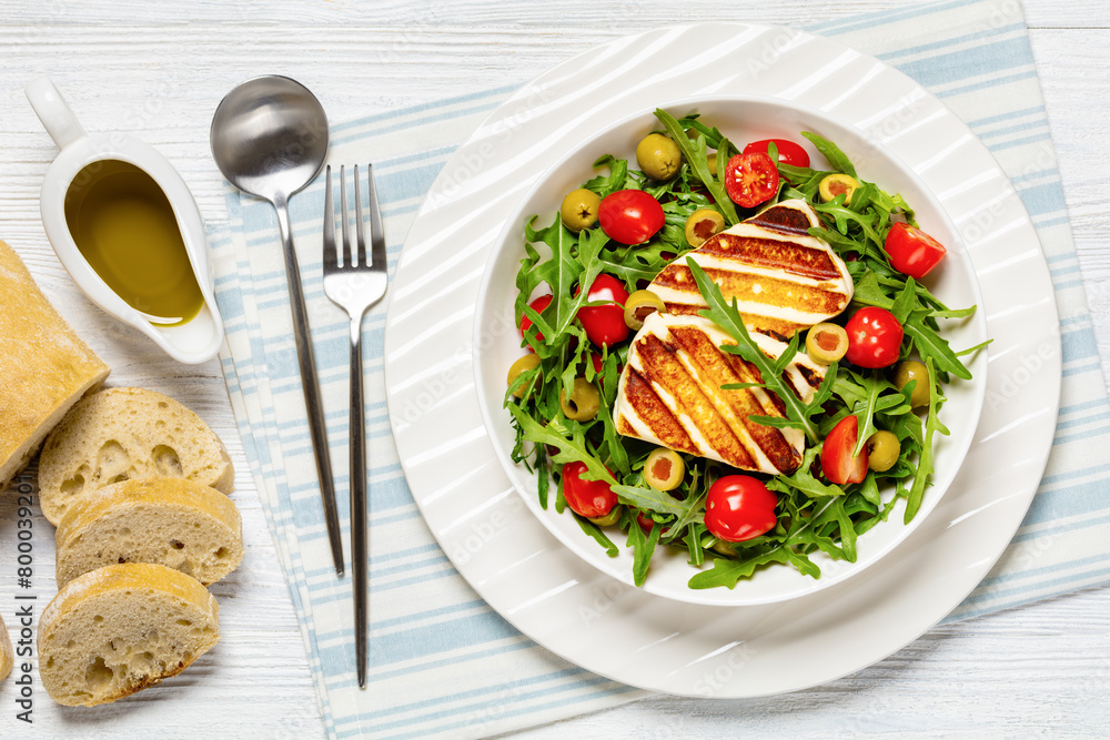 salad with grilled halloumi greek cheese in bowl salad with grilled halloumi greek cheese in bowl