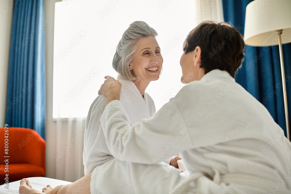 A loving tender senior lesbian couple. A loving tender senior lesbian couple.