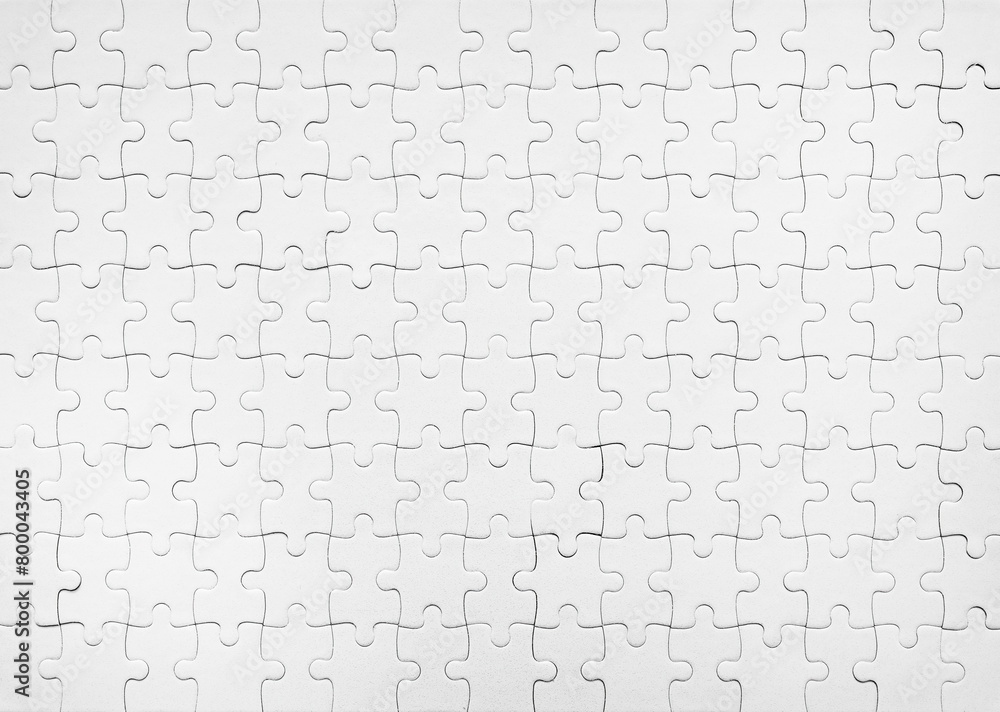 Blank white jigsaw puzzle pattern as mockup background