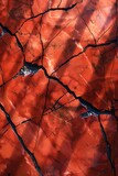 Red Marble Texture With Black Veins, Creating An Abstract Background With Sun Light And Shadows