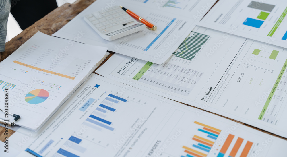 Analyzing results, an accountant, businessman or financial expert analyzes results. Calculates results from graphs, business reports and financial charts. Company stock market. Analyzing results, an accountant, businessman or financial expert analyzes results. Calculates results from graphs, business reports and financial charts. Company stock market.