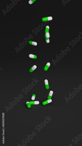 White and green pills falling on black background in slow motion. Drugs, pills, tablets, medicine concept. 3d render animation. Vertical video (ID: 800059088)