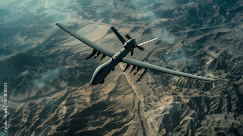 A military combat UAV is flying over a desert landscape. A drone attack. The concept of using modern technologies