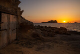 Sunset with a fishing hut at cala Comte beach, Sant Josep de Sa Talaia,  Ibiza, Balearic Islands, Spain