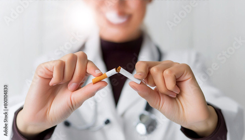 Extreme close-up of a female smiling doctor breaking a cigarette. Stop smoking  prevention  anti smoking campaign and world no tobacco day concept. Generative Ai.