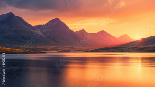 Stunning landscape showcases a sunset sky casting its glow over mountains adjacent to the ocean. With long exposures capturing the essence  the water appears smooth  vibrant colors saturate landscape