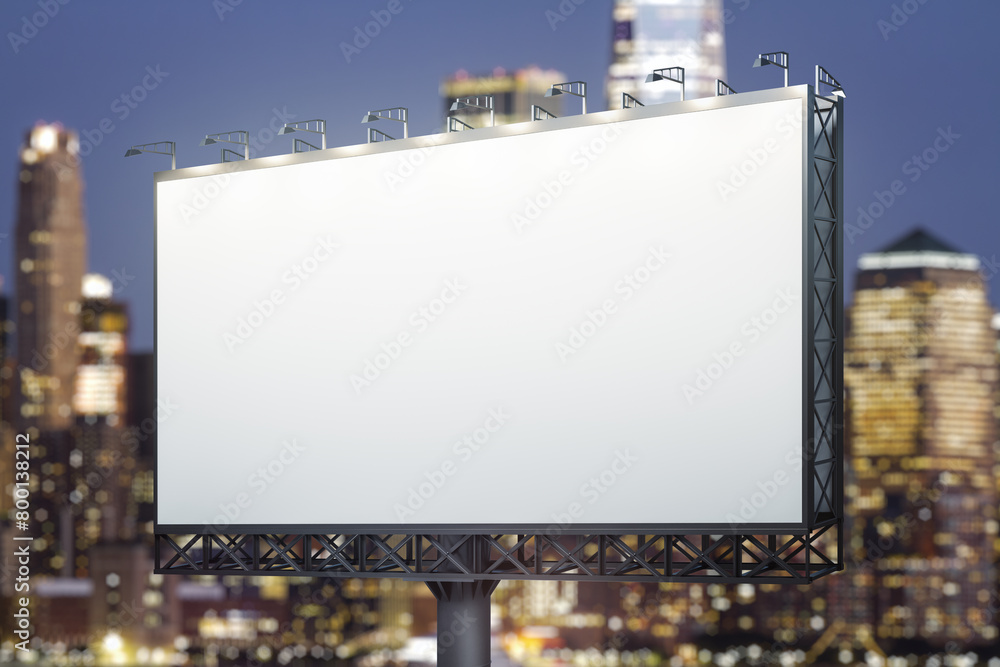 Fototapeta premium Blank white horizontal billboard on skyline background at evening, perspective view. Mock up, advertising concept