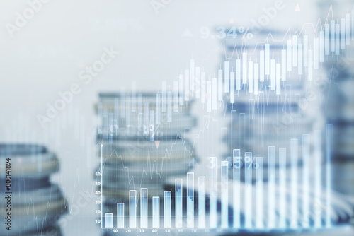 Abstract virtual financial graph hologram on stacks of coins background, forex and investment concept. Multiexposure