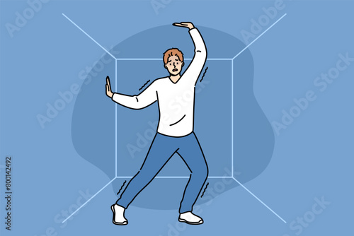 Man suffering from claustrophobia experiences shock when finds himself in confined space and needs quick release to freedom. Problem of claustrophobia due to psychological trauma received in childhood