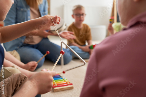Children having music classes with music instruments