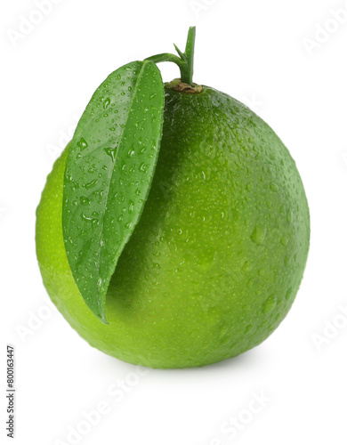 Wet green ripe lime with leaf isolated on white