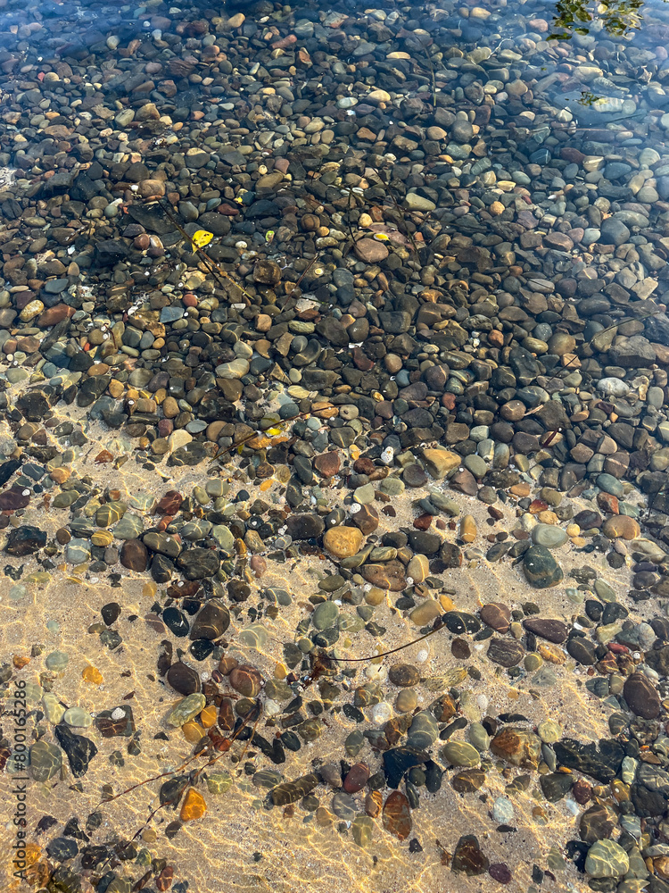 Pebble under the clear water at the river. Pebble under the clear water at the river.
