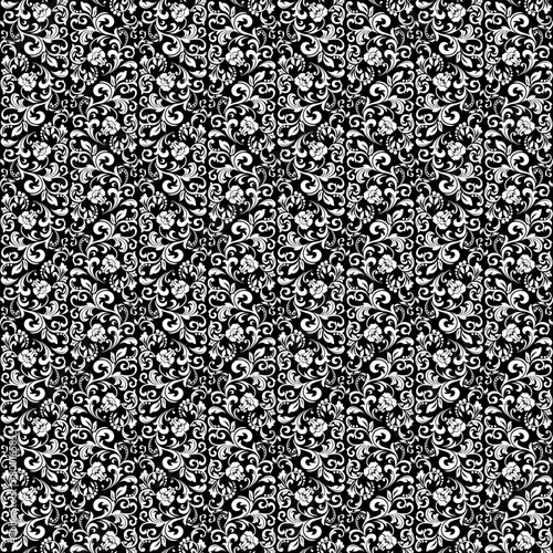 Wallpaper in the style of Baroque. Seamless vector background. White and black floral ornament. Graphic pattern for fabric, wallpaper, packaging. Ornate Damask flower ornament.