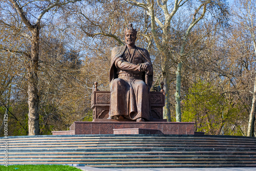 Amir Temur Monument in Samarkand, Uzbekistan, Central Asia - Bronze statue of the famous conqueror who founded the Timurid Empire seated on his throne photo