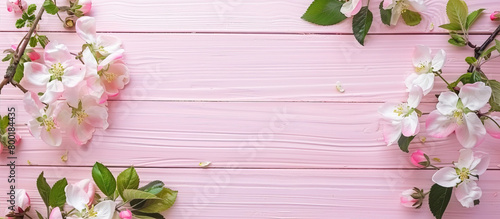 Flowers on wooden pink background 