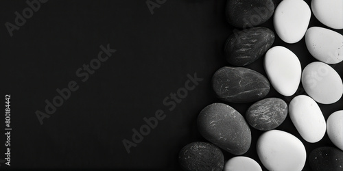 Black background with round stones on the right edge 