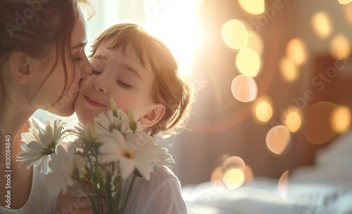 Closeup of a happy mother's day child son Surprise gives flowers for mother on holiday and kisses a mother with a blurred or bokeh background of bedroom  #800184840