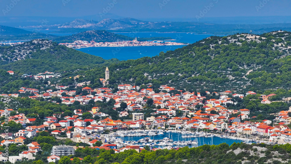 AERIAL: Picturesque view of two quaint old towns on the coasts of Hvar island.