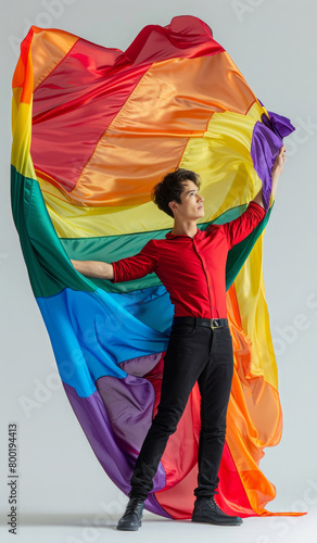 illustration of a man holding a rainbow flag. The flag is colorful and has a rainbow pattern © alicia moneva