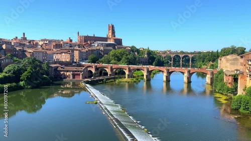 Tarn river, Pont Vieux bridge and Sainte-Cecile Cathedral in Albi, France on a sunny day photo