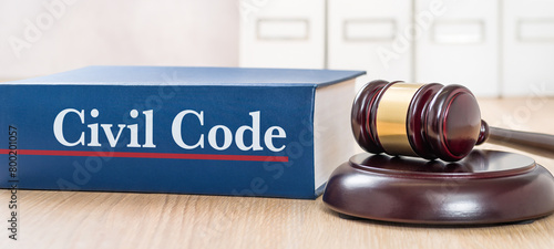 A law book with a gavel - Civil Code © Zerbor