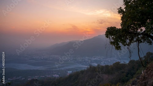 Sunset over a city Timelapse 4K photo