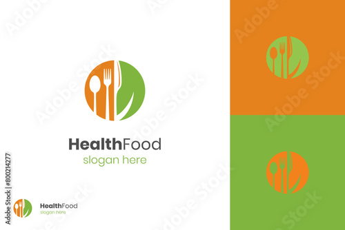 Healthy food vector logo template. Organic food vector logo design. Fork, spoon and leaves graphic shape