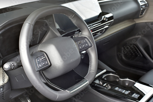 Steering wheel in the new car © algre