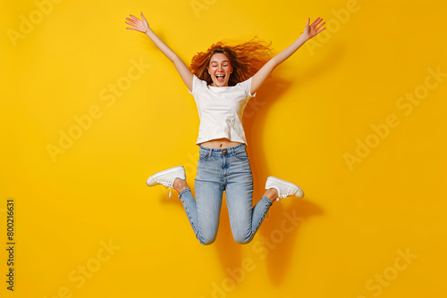 Full length photo of young excited lady have fun carefree chill hang-out club isolated over yellow color background
 photo