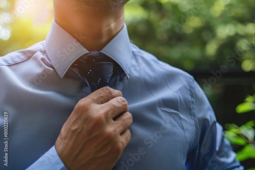 Business man take off tie after working hour
 photo