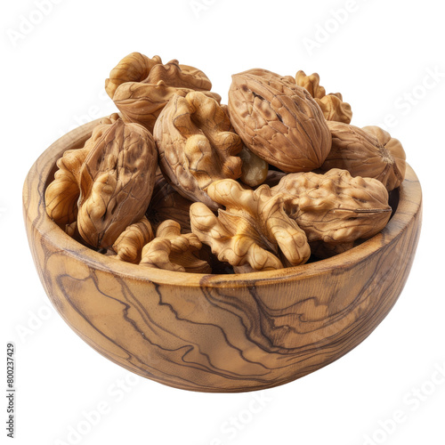 Walnuts in a wooden bowl isolated on transparent background