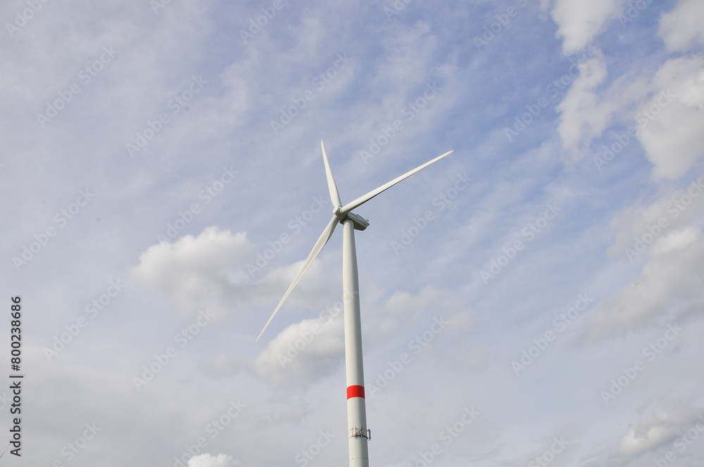 Wind turbines. Power generation. huge windmill against the sky Wind turbines. Power generation. huge windmill against the sky