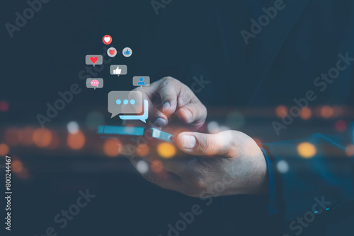 Social media and digital online concept, man using smart phone. The concept of living on vacation and playing social media. Social Distancing ,Working From Home concept. Social media concept. photo